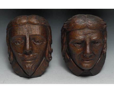The English Civil War - a pair of 19th century oak carved portrait bosses, Charles I and Oliver Cromwell, 20cm long 