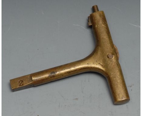 Copoclephily - a 19th century brass carriage key, the T-shaped haft enclosing a further folding door key, each numbered 2', 8