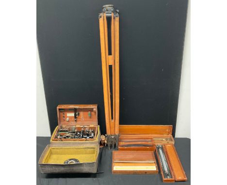 A Cooke, Troughton &amp; Simms theodolite, model number Y887, mahogany case with stitched leather carry case, mahogany tripod