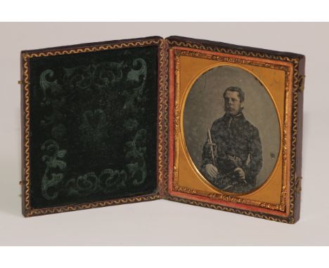 Photography - The American Civil War - a 19th century ambrotype photograph, portrait of a US soldier, oval, 7.5cm x 6cm, tool