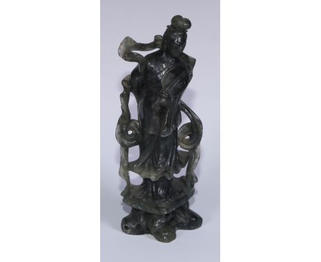 A Chinese carved jade figure, of a courtesan holding a rabbit, 29cm high; another, holding a fan, 20.5cm high (2)