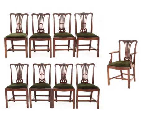 A Set of Nine George III Mahogany Dining Chairs, late 18th century, including one carver, the acanthus carved top rails and w