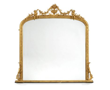 A Carved Giltwood and Gesso Overmantel Mirror, circa 1860, the original mirror plate within a stif-leaf and egg and dart bord