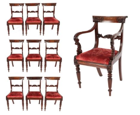 A Set of Nine Carved Mahogany Dining Chairs, circa 1820/30, including one carver, with carved horizontal splats and later rec