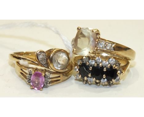 Four various 9ct gold gem-set rings, sizes K-N, gross weight 10g.