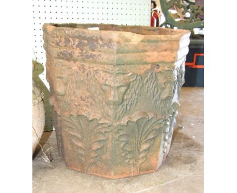 A terracotta octagonal planter, a rectangular cast concrete planter and another, (3).