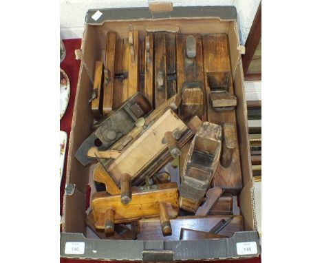 A vintage wood and metal woodworking plane, the blade stamped 'Lawson, Sheffield', 17cm long and a collection of moulding and