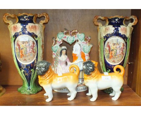 A 19th century Staffordshire flat-back figure 'Fortune Teller', 30cm high, a pair of 20th century ceramic pug dogs standing 1