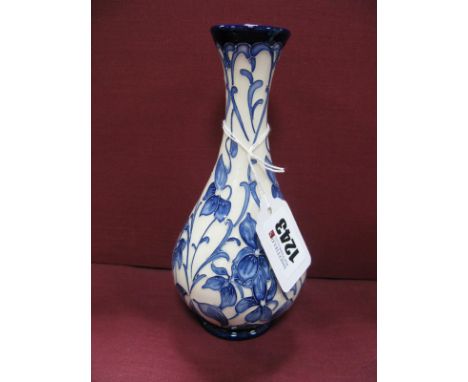 A Moorcroft Pottery Vase, painted in the 'Viola' pattern, shape 80/6, impressed and painted marks, 16.5cm high.