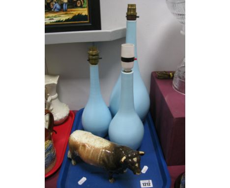 Three Poole 'Power Blue' Table Lamps, of slender pear form, 38cm and smaller - untested sold for parts only; and a Beswick 'L