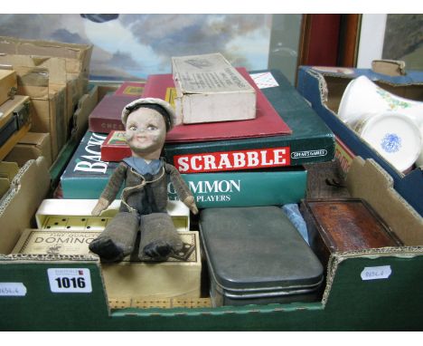 A Norah Wellings Sailor Boy Doll, brass topped and other cribbage boards, cased dominoes, vintage table/board games:- One Box