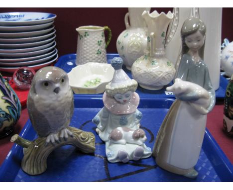 Lladro Models 'Hawk Owl', 'Pierrot with Puppy' and 'Young Girl with Piglet'. (3)