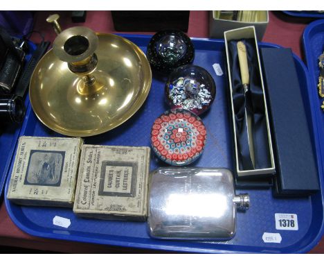 A Millefiori Paperweight, two further paperweights, brass chamber stick, plated hip flask, lantern slides (boxed), two cased 