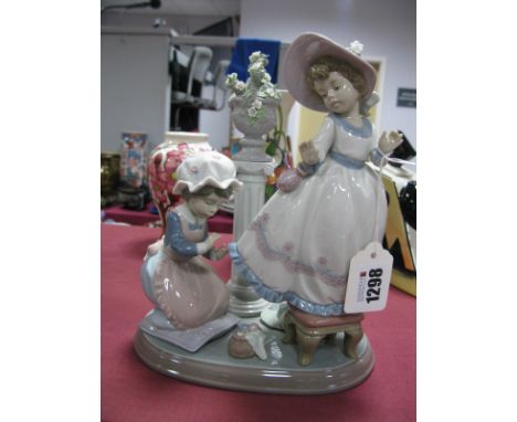 A Lladro Model 'A Stitch in Time'