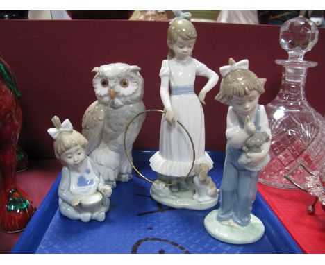 Four Nao Models, including owl, girl and puppy with hula, girl with doll etc:- One Tray