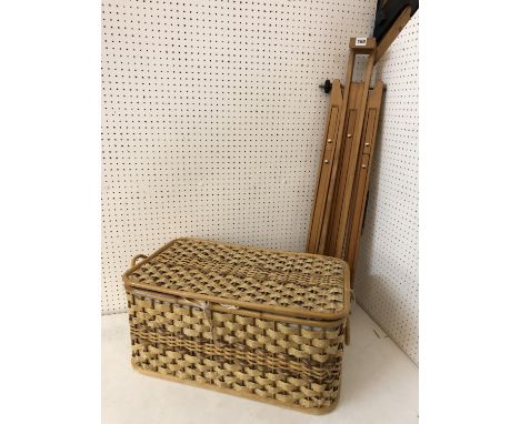 A Daler-Rowney portable beech wood artists easel with a cane hamper containing art materials: Winton oil paints, Daler-Rowney