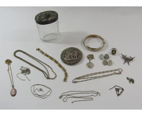 Collection of silver jewellery comprising a vintage hinged bangle, a large Egyptian white metal filigree brooch, citrine dres