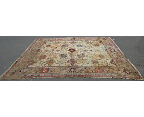 A large old worn and torn Donegall type carpet with a large floral pattern (af) together with others carpet fragments 310 x 2