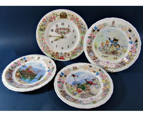 A collection of Wedgwood Foxwood Tales wall plates, together with a Foxwood Tales wall clock with quartz movement 
