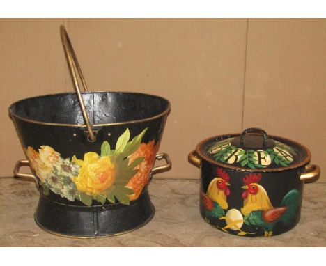 A helmet shaped coal scuttle, a rectangular butlers type tray and folding stand and an enamel saucepan and cover, all with de
