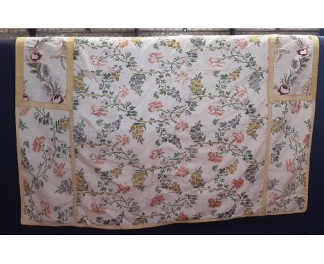 Antique silk panel, possibly an 18th century cover for a centre stool as it is shaped on 3 sides; the silk is embroidered wit