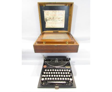 A Remington portable typewriter, purchased 27th October 1927, together with a Calesco copier of the same vintage 