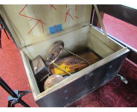 A vintage black canvas and iron bound trunk 69cm wide, containing an assortment of old tobacco pipes, a copper kettle with bu