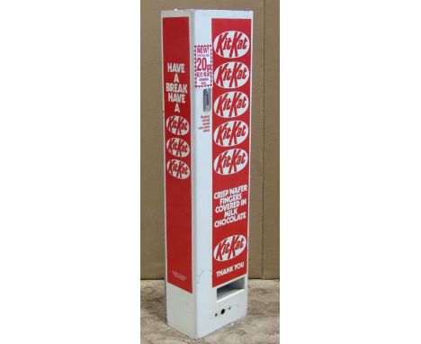 A vintage steel wall mounted Kit-Kat vending machine, 22cm wide x 13cm deep x 90cm high 