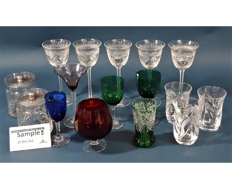 A mixed selection of fine cut glassware, with slender wine glasses with faceted stems and other glassware including, brandy g