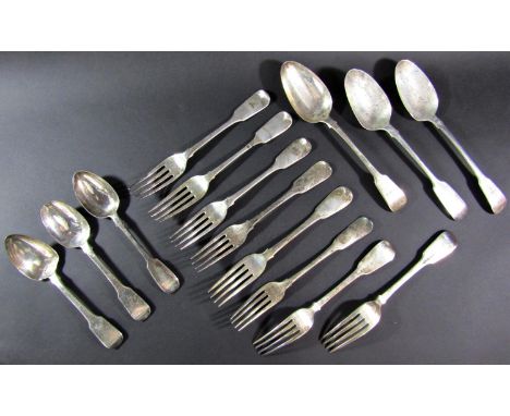 An assortment of Georgian silver flatware, dessert spoons, serving spoons and forks, 29oz approx 