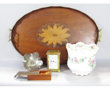 An Edwardian mahogany oval tray with a central floral inlaid medallion and brass handles, 60cm x 40cm, a stoneware storage ja