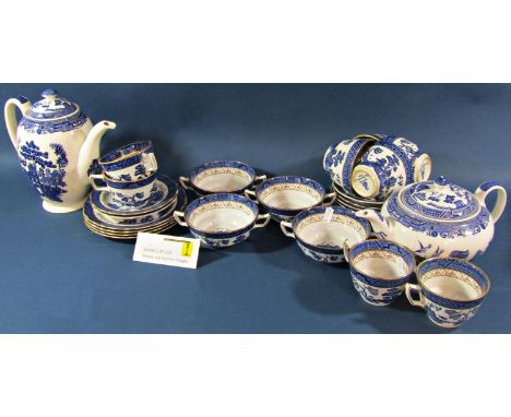 A Booths Real Old Willow pattern tea and coffee service together with additional soup bowls 