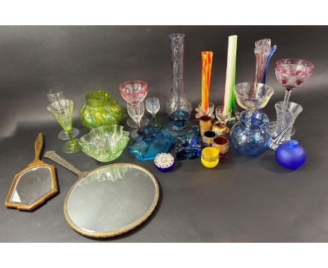 A mixed selection of glassware including a pair of Art Deco squat hexagonal blue candlesticks, Murano design vases, colourful