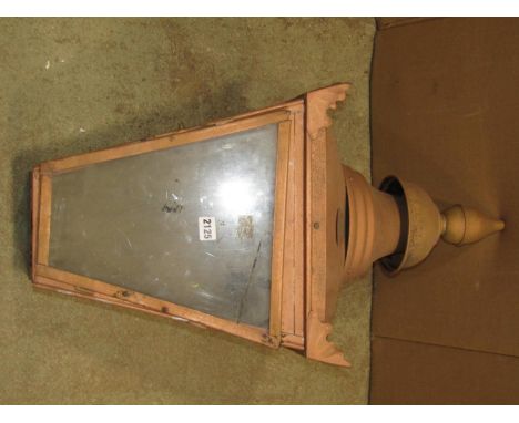 An exterior street lantern post hood of square tapered form with glazed panels and painted to simulate copper finish 