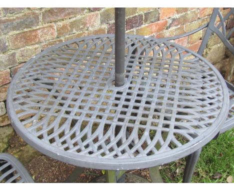 A contemporary grey painted light steel three piece garden terrace set with lattice detail, complete with parasol and base 