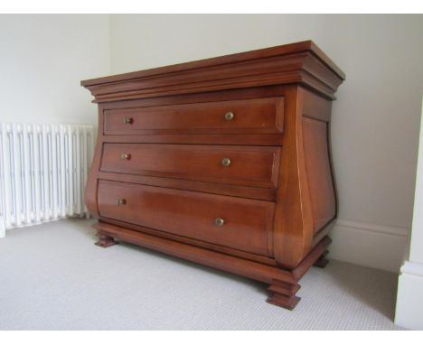 A good quality continental Bombe shaped commode of three long drawer on shaped bracket supports, 110cm wide 
