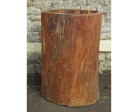 A chip carved hollowed out tree trunk planter 87 cm high 