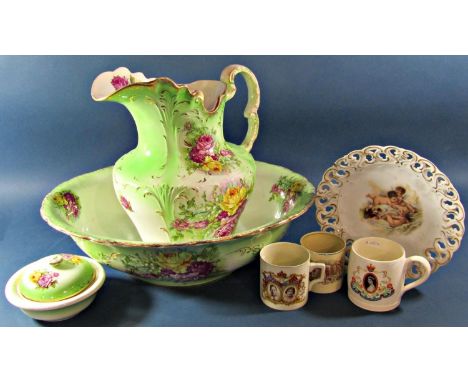 A flamboyant Edwardian ewer and basin with rose bud detail, with further Royal commemorative ware 