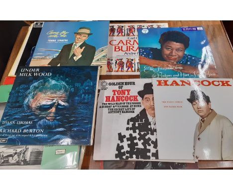 A collection of vintage long playing records including Golden hour of Tony Hancock ,Hancock the blood donor the others mainly
