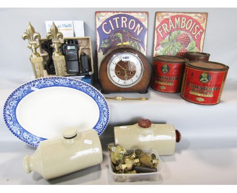 A miscellaneous collection of items including, two French tin adverts 'Framboise' and 'Citron', an oak mantel clock, two pott