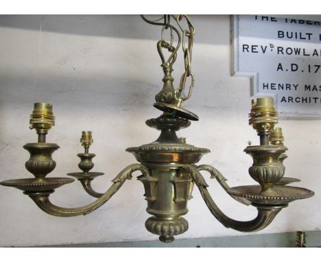 A cast brass hanging  ceiling light with knopped stem and eight scrolling branches, 75 cm drop (af) 