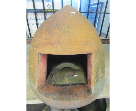 A weathered clay/terracotta helmet shaped bread oven impressed number 10, 56 cm high (af) 