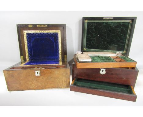 A 19th century walnut writing slope and a 19th century rosewood travelling vanity box, a brass carriage clock, a wooden box w
