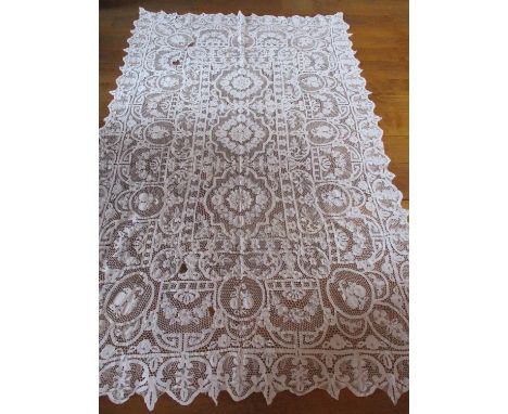 A collection of 19th and 20th century hand sewn and machine made crotchet tablecloths A/F, together with fifteen square table