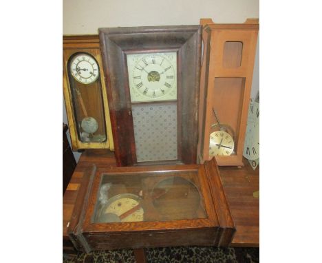 Clock parts to include regulator style cases, a Magneta electric clock movement, and other items Location: G 