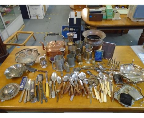 A mixed selection of silver plate, brass and copper wares and assorted cutlery to include a hop flask, photograph frames, cop