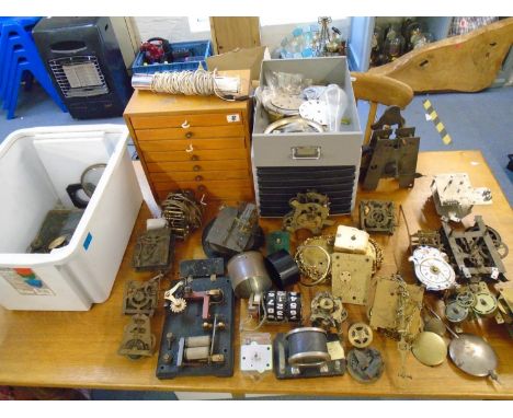 A selection of clock movements and other parts, to include chronometer dials signed Frosham, Ulysse Nardin, Morton, Victor Ku