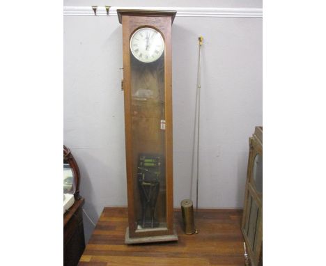 An oak Synchronome electric master clock case, with a painted dial, a pendulum and a movement A/FLocation: G 