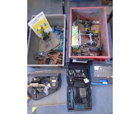 A Chronos No126 horological pinion mill machine, a Vibrograf M180 Quartz generation, along with various clock repairing tools
