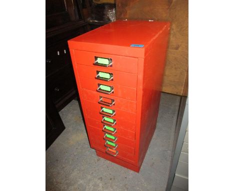 A vintage red metal chest of ten drawers, 71 h x 28 w x 41cm dLocation: G 